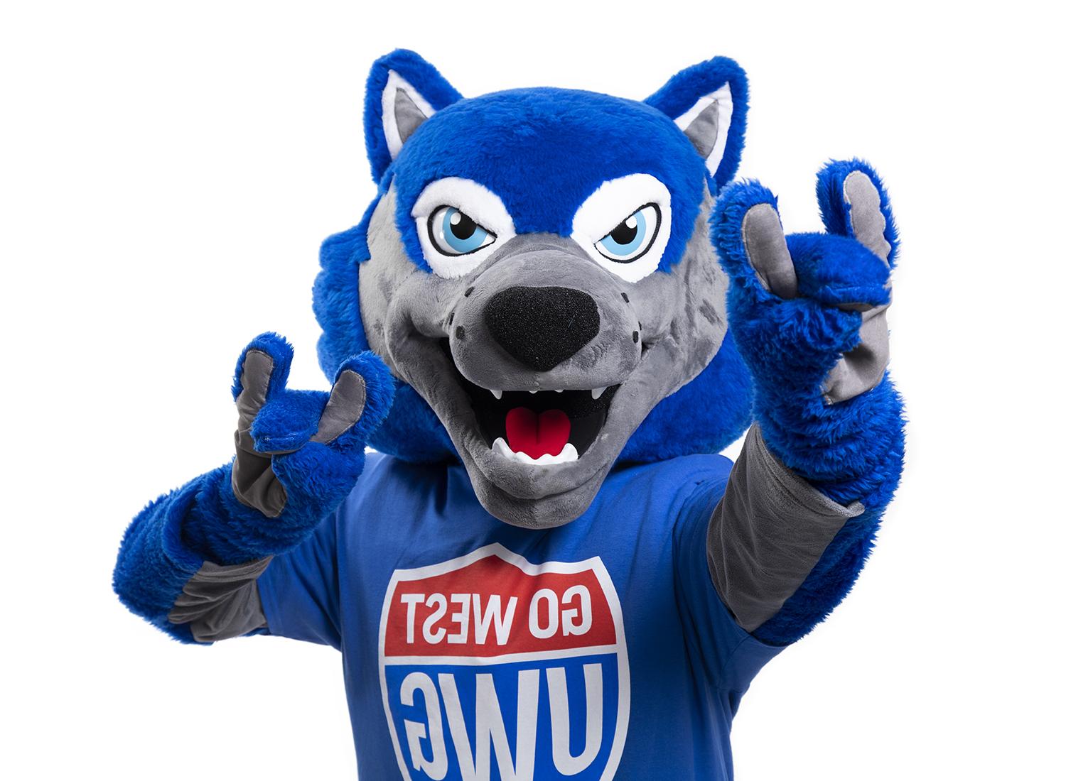 在线博彩 mascot, Wolfie, holding up two wolf hand signs. 